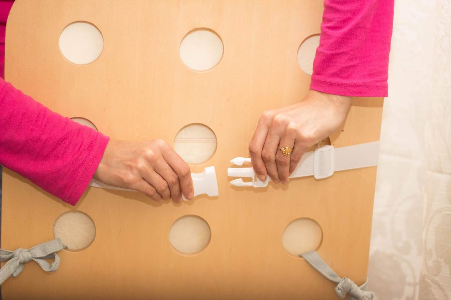 Memory foam back support pillow for pain relief and comfort.